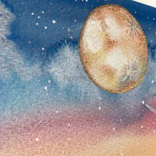 Close up of a moon painted with metalic watercolour paint